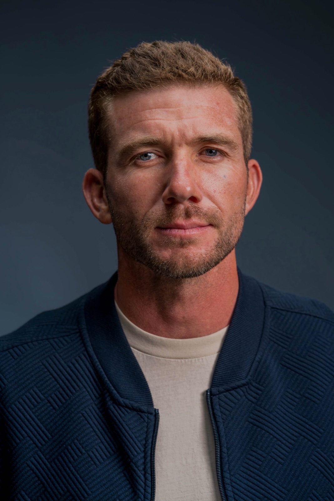 Portrait of Charles in a navy jacket